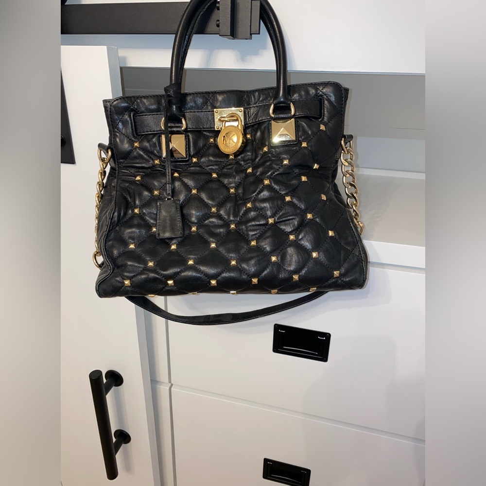 Michael Kors | Black bag with gold colored studs